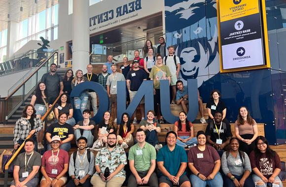 Group photo of graduate students in the Campus Commons.